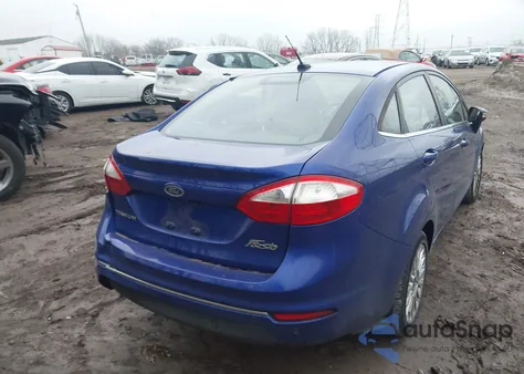 2014 Ford Fiesta Titanium из США, поврежденный, VIN 3FADP4CJ3EM220218